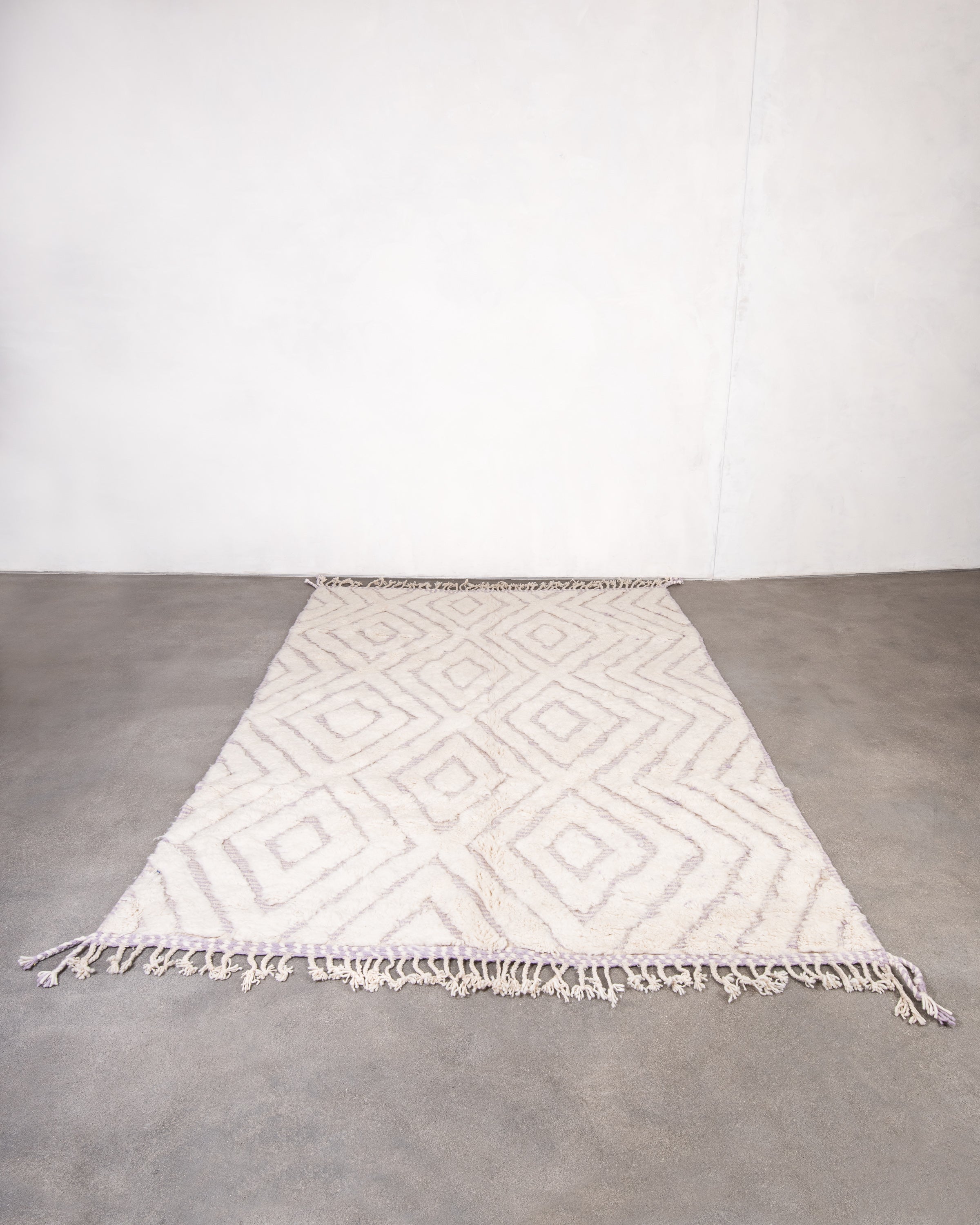 Modern, designer, handcrafted Berber rug from Morocco. Beniourain with beautiful colors and patterns and fluffy wool texture.